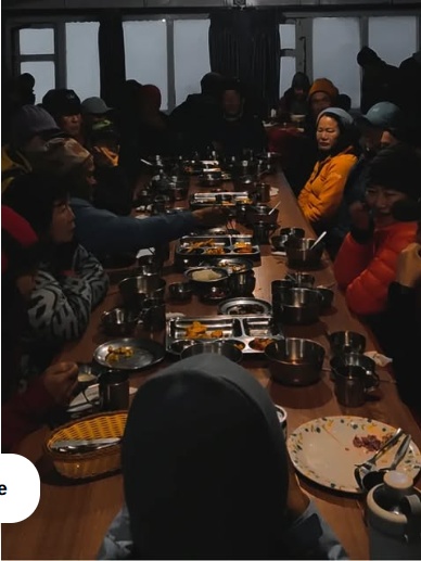 Trekkers Enjoying Hot Steaming Dal Bhat Dinner